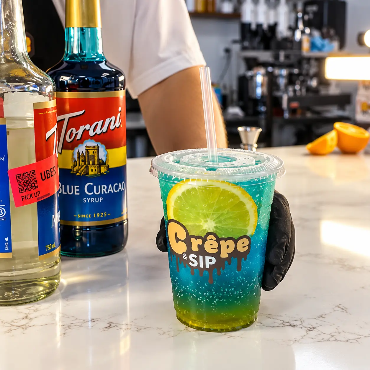 Blue and yellow mojito in a Crêpe & Sip cup